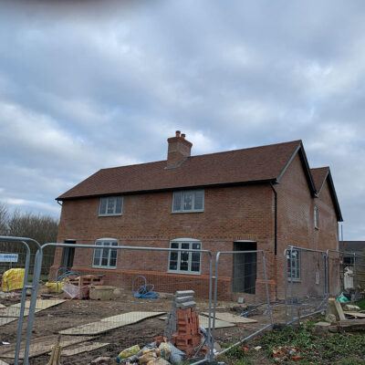 The development of two three-bedroom cottages in Henton, Oxfordshire, by Signia Turn Key