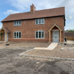 The development of two three-bedroom cottages in Henton, Oxfordshire, by Signia Turn Key